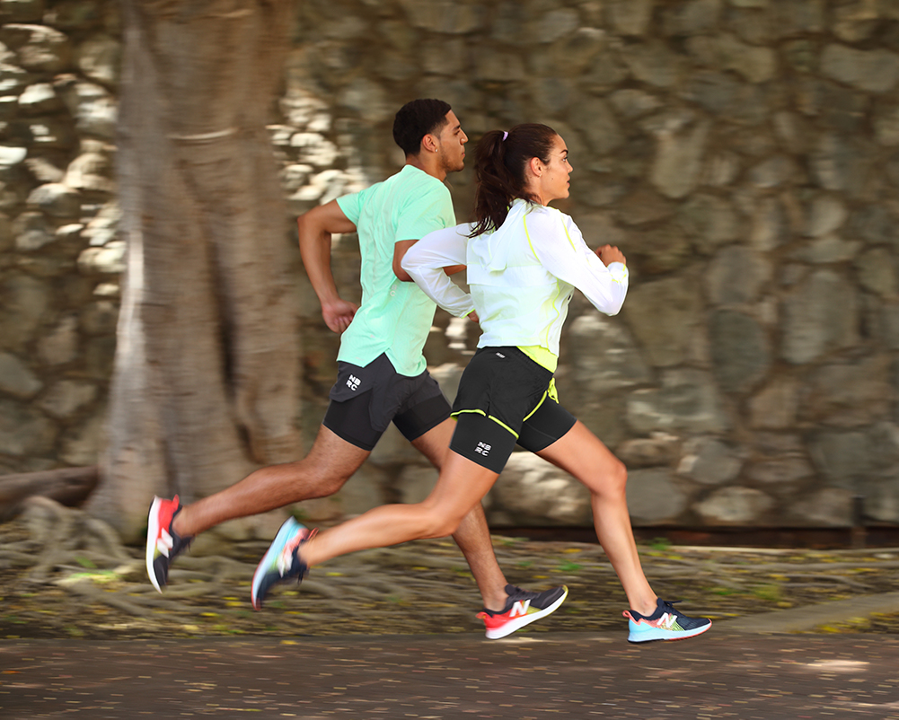 Two runners running side by side.