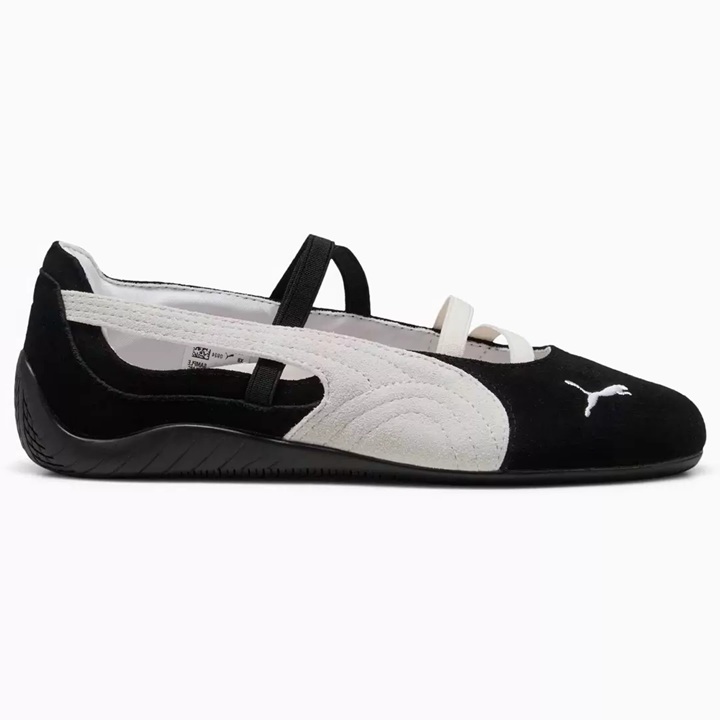 Sleek black suede PUMA sneakers with ballet-shoe styling. Includes an open design at the top of the foot with multi-strap detailing. Contrast white PUMA stripe at the side and white embroidered PUMA Cat logo at the top forefoot. Black rubber outsole. follows back to school fashion trends